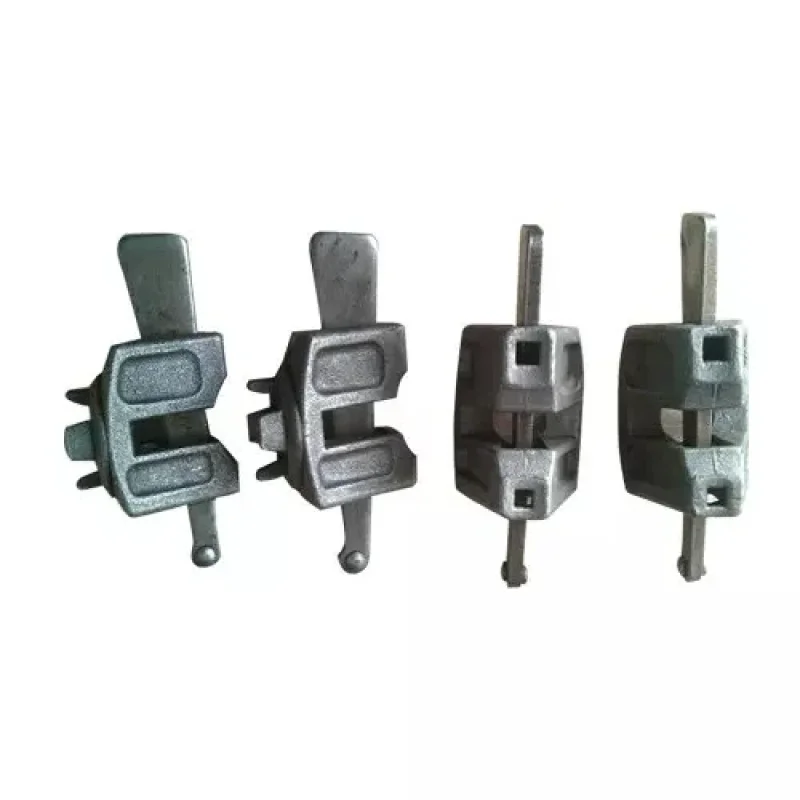 Heavy duty cast steel ledger end component with a precision wedge slot and reinforced triangular structural shoulders for modular scaffolding assembly